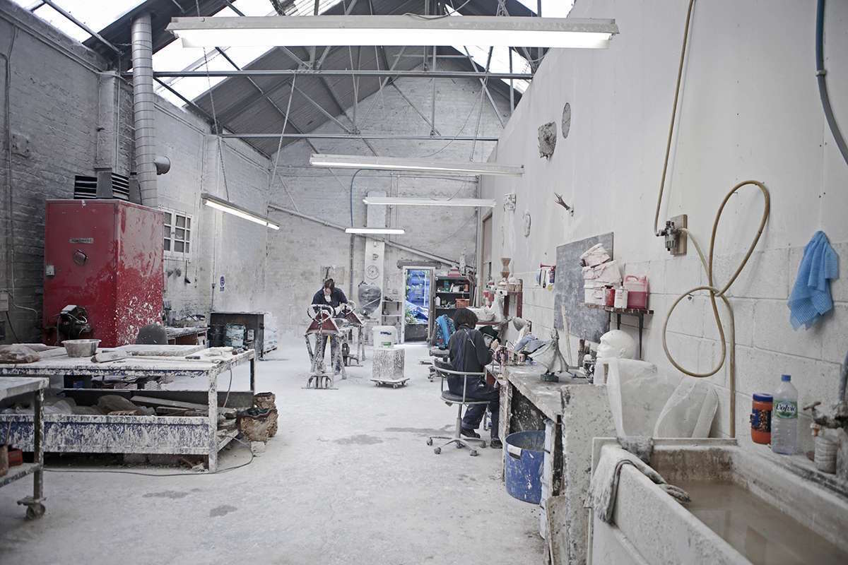 Interior of the Powderhall Bronze workshop, with workbenches and sculptures in progress