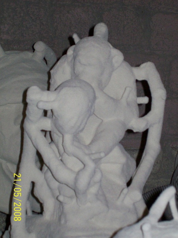 Wax sculpture fitted with sprues runners and gates